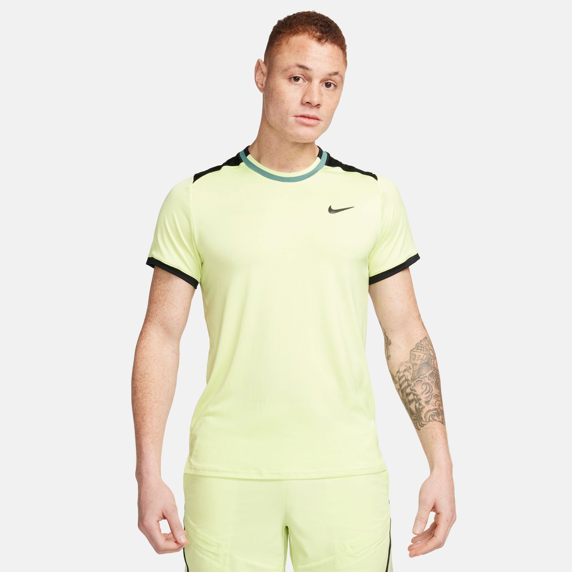 yellow nike tennis shirt