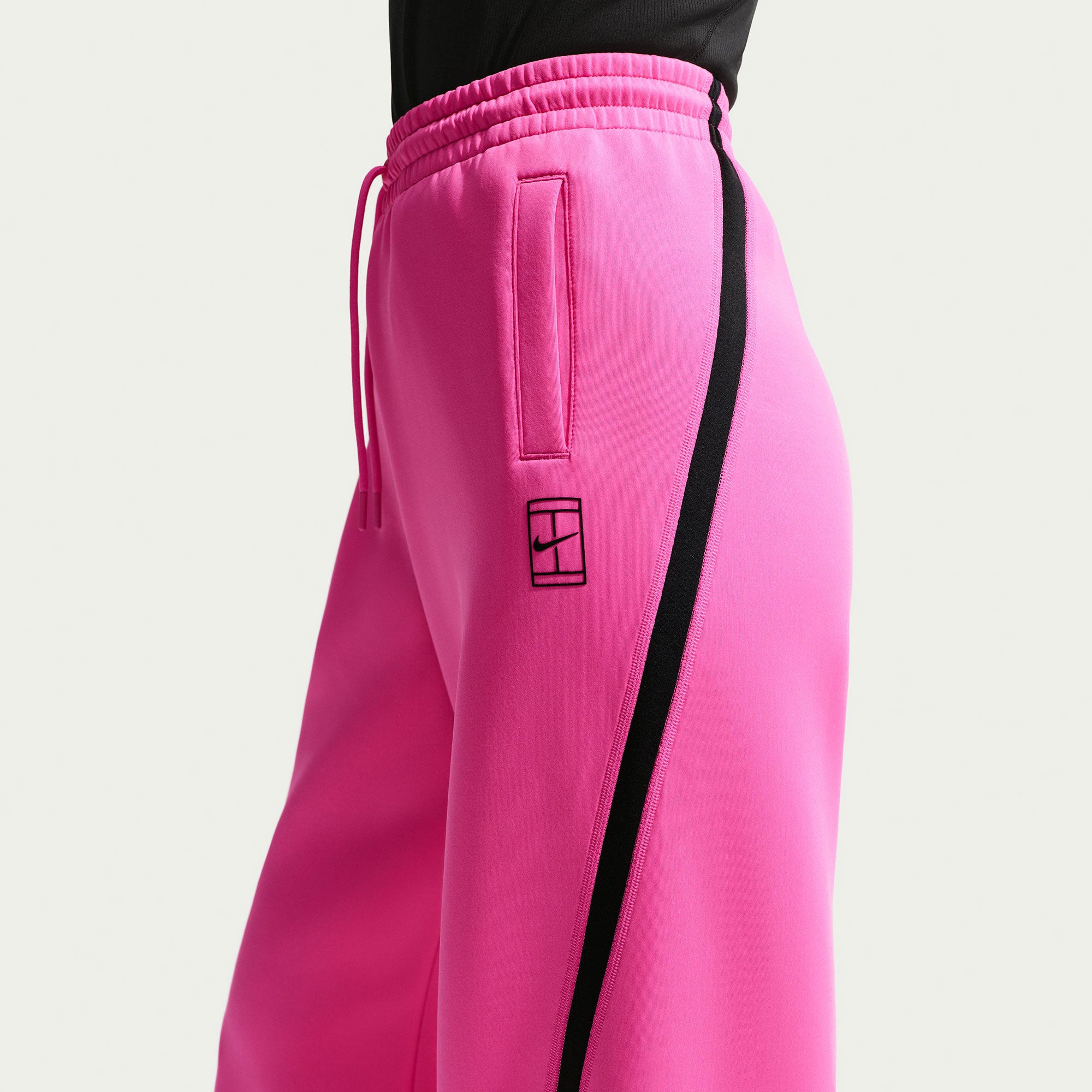 pink nike tech pants