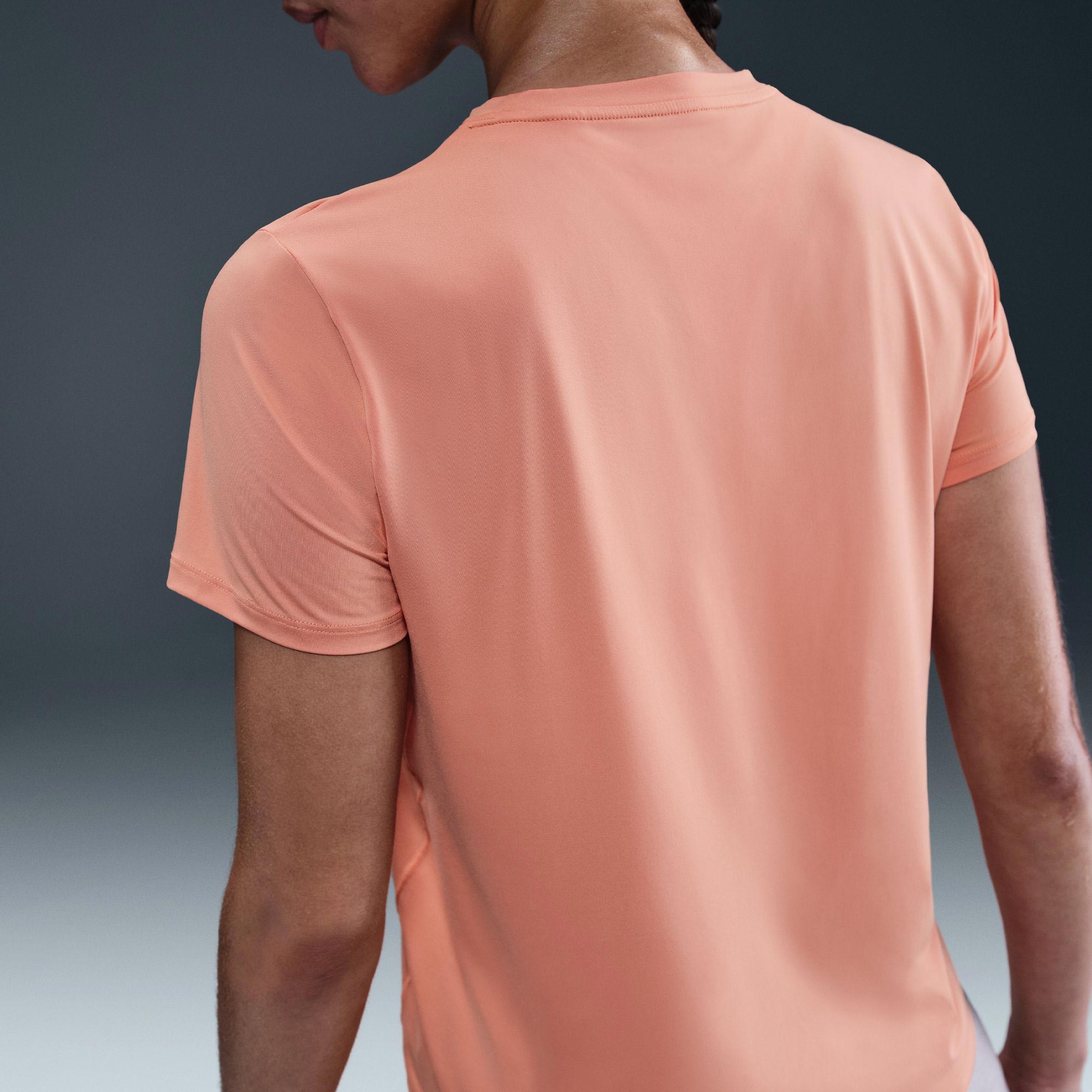 coral color nike shirt