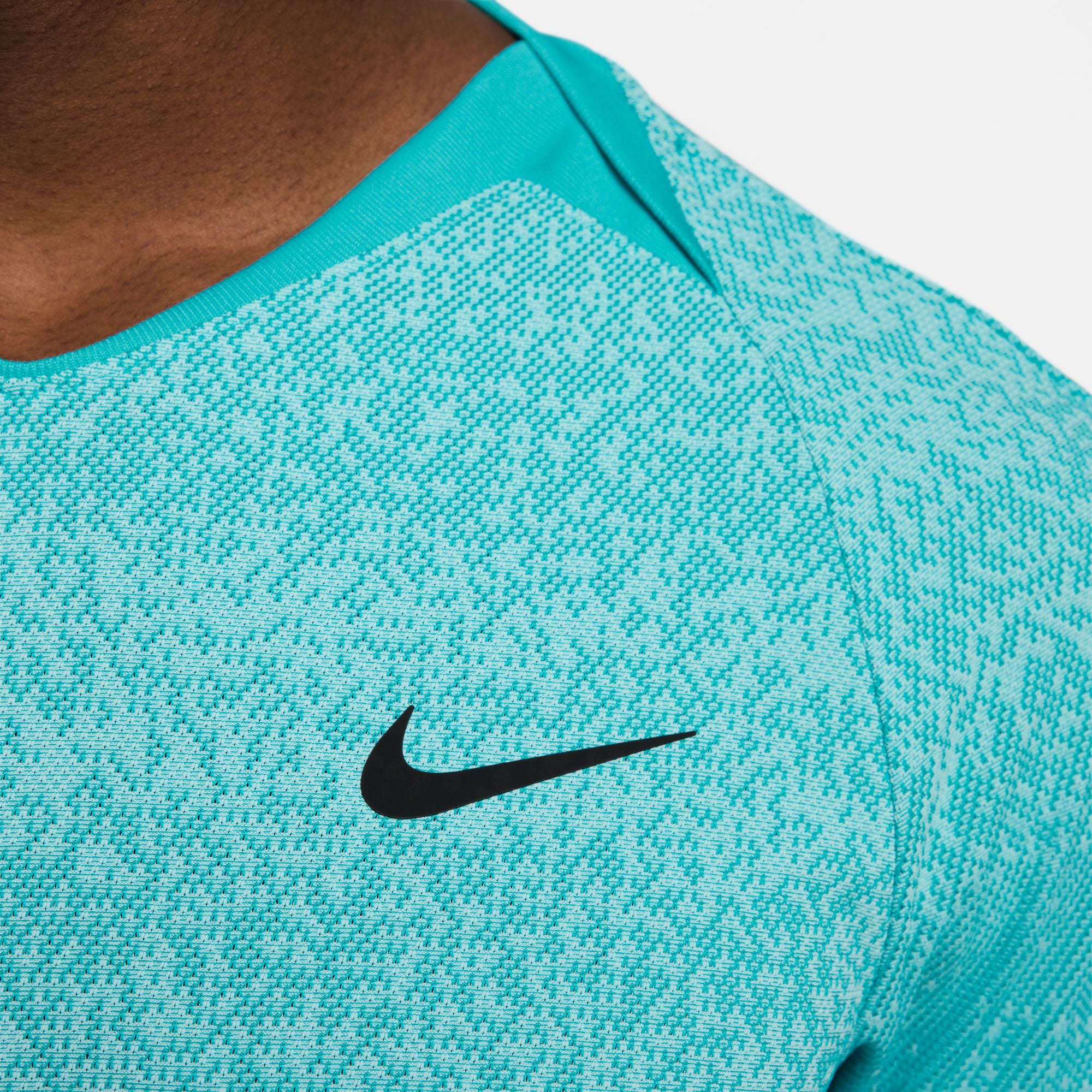 neon green and blue nike shirt