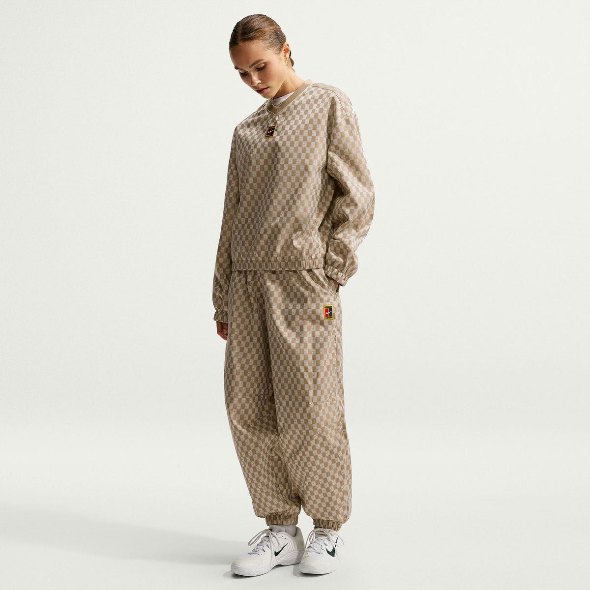 NikeCourt Court Women's Oversized Mid-Rise Tennis Pants - Brown (1)