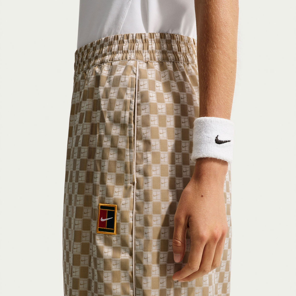 NikeCourt Court Women's Oversized Mid-Rise Tennis Pants - Brown (4)