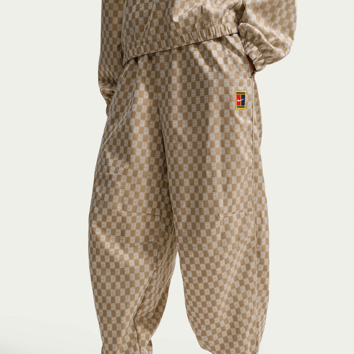 NikeCourt Court Women's Oversized Mid-Rise Tennis Pants - Brown (5)