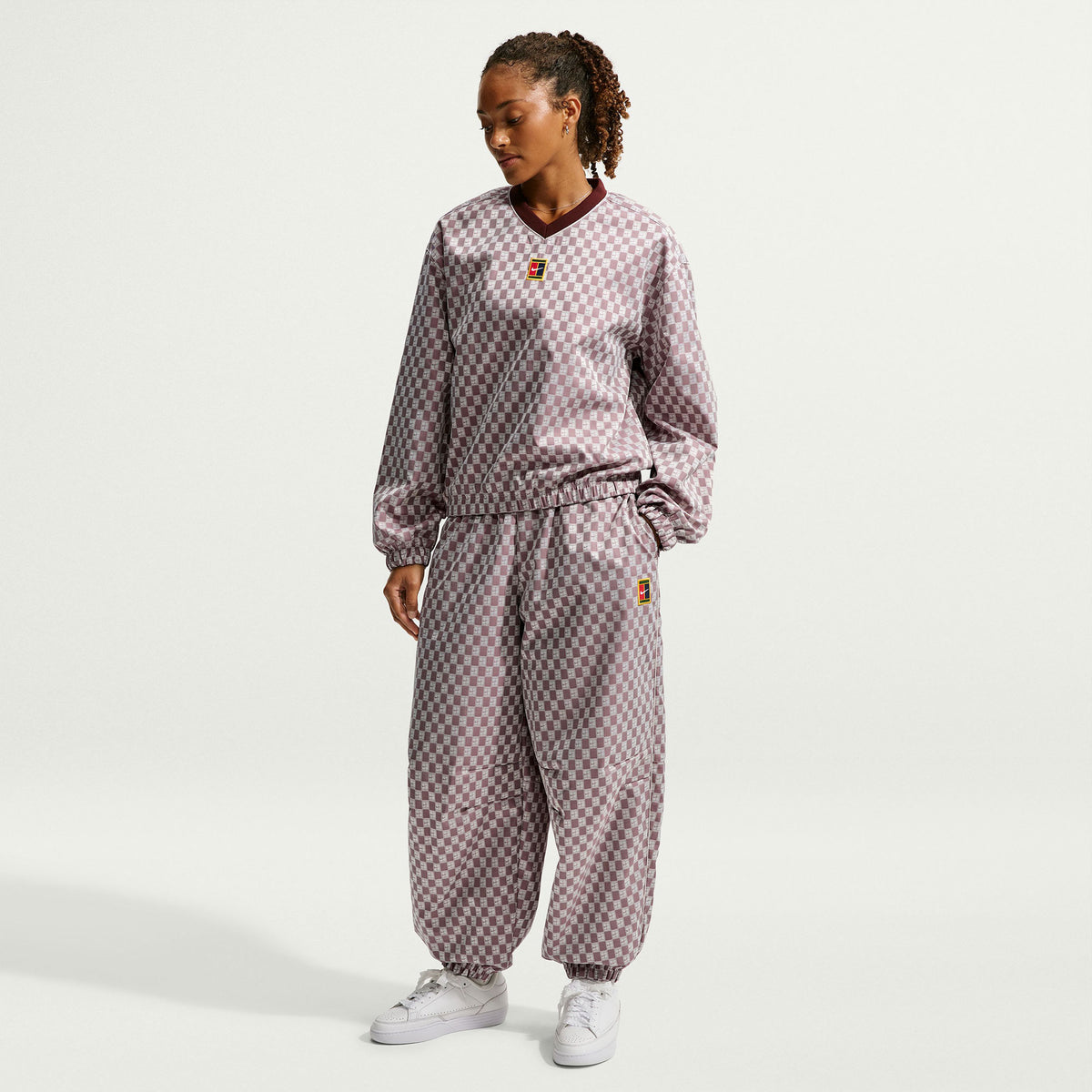 NikeCourt Court Women's Oversized Mid-Rise Tennis Pants - Red (1)