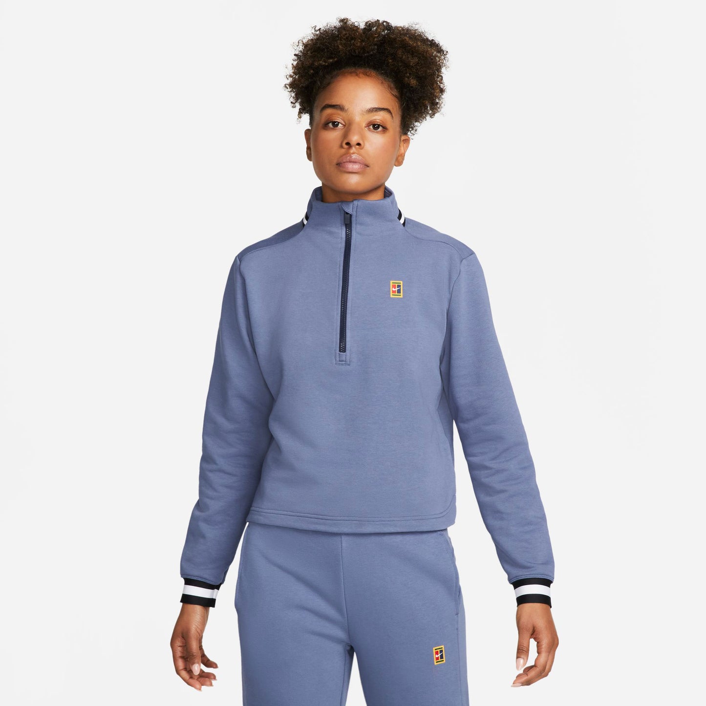 NikeCourt Dri-FIT Heritage Dames Fleece Tennistop Blue (1)